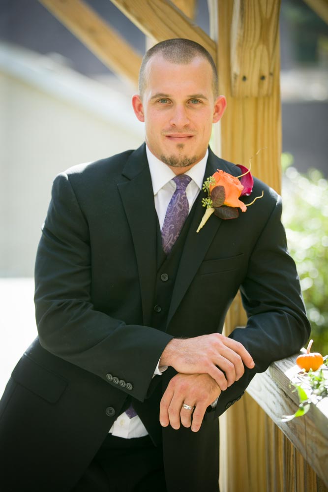 Groom Standing Against the wall